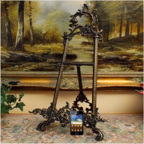 DUŻA MOSIĘŻNA SZTALUGA POD OBRAZ, FOTOGRAFIĘ LUB PORCELANĘ W STYLU BAROKOWYM 56 CM.